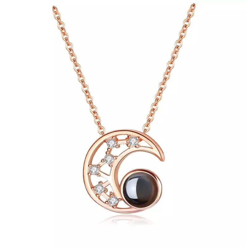 Star moon projection necklace